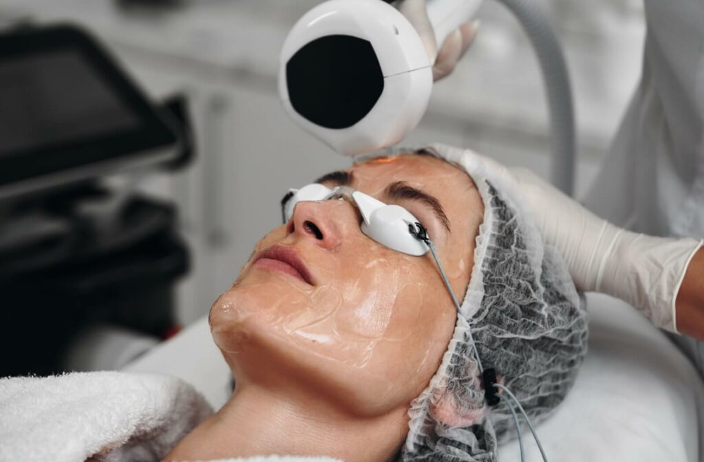  A person wears protective goggles while undergoing their IPL therapy session to improve the look of facial wrinkles and fine lines.